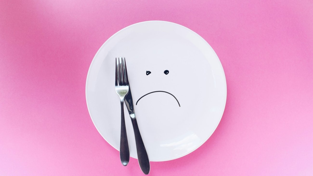 silver fork and knife on plate