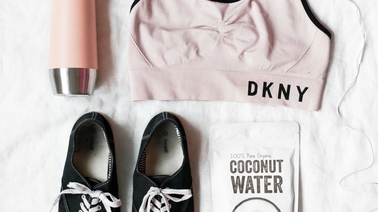 pair of black lace-up shoes near DKNY sport bra